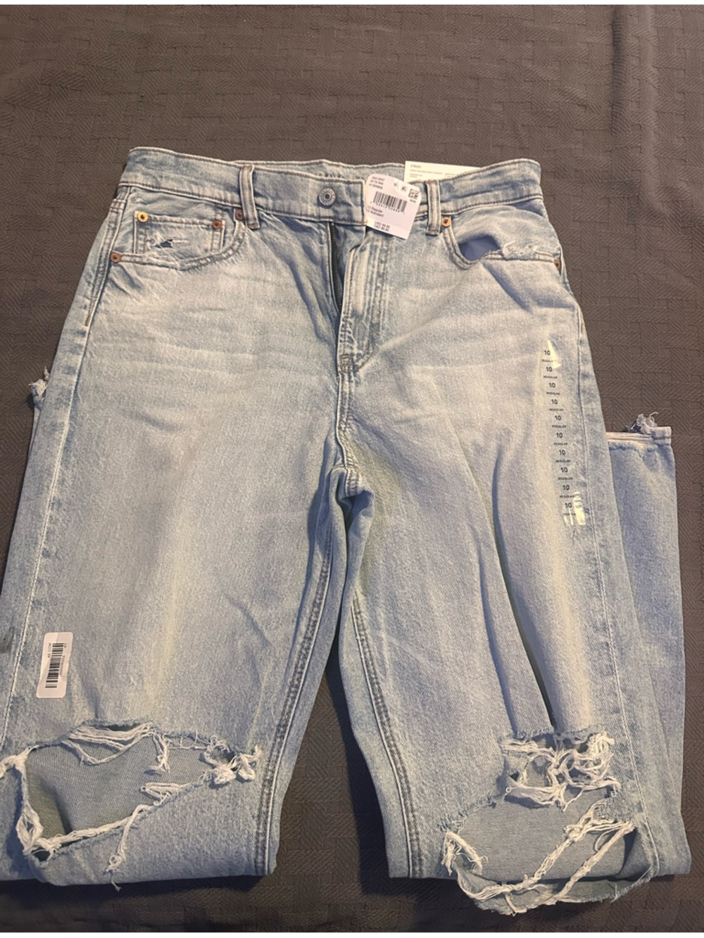 American Eagle Outfitters Faded Light Blue Distressed Boyfriend Jeans